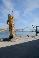 Yellow pole on by the sea