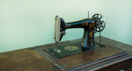 Old metal manual retro sewing machine