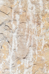 Obraz premium Close Up Weathered Brownish Natural Stone Texture