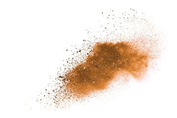 Brown powder explosion isolated on white background.