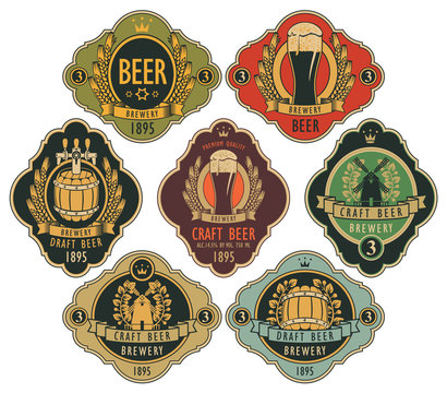 Vector set of ornate beer labels in figured frames with barrel, beer glass, mill, laurel wreath, ears of wheat and crown in retro style.
