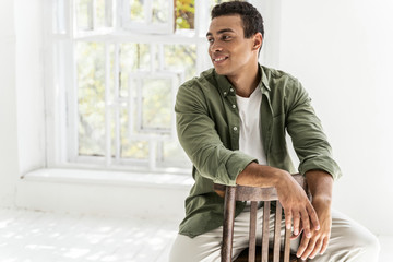 Cheerful man beginning his day at home