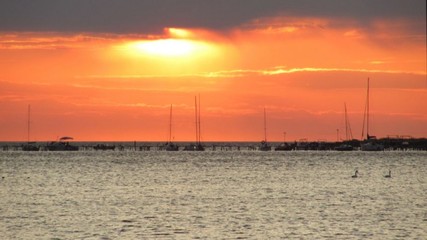 Fototapeta na wymiar orange sunset over the sea in october
