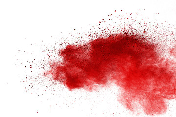 Red powder explosion on white background. Colored cloud. Colorful dust explode. Paint Holi.