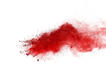 Red powder explosion on white background. Colored cloud. Colorful dust explode. Paint Holi.