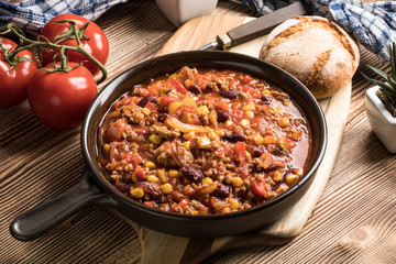 Chili con carne in a clay pan.
