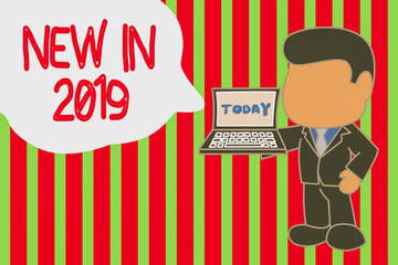 Writing note showing New In 2019. Business concept for what will be expecting or new creation for the year 2019 Standing professional businessman holding open laptop right hand side