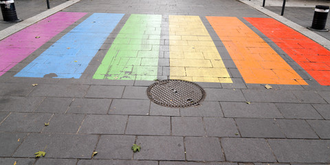 marking in LGBT colors lesbian gay pedestrian crossing in street city