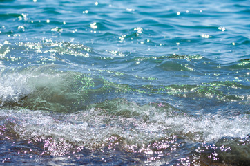 Soft wave of sea on sandy beach. Background.