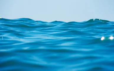 Foto op Canvas Blue sea water background texture © photolink