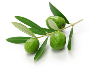 green olives with leaves isolated on white background