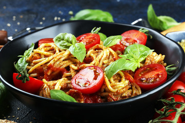 Plate of delicious spaghetti Bolognaise or Bolognese with savory minced beef and tomato sauce garnished with parmesan