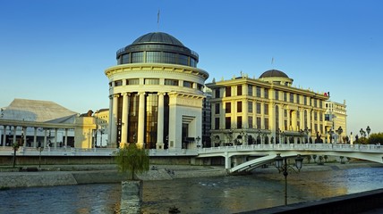building in skopje at river during autumn
