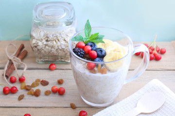 Glass of yogurt with muesli and fresh berries. Healthy lifestyle concept.