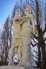 statue of angel with cross