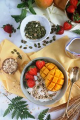 Healthy oats and fruit cereal flat lay