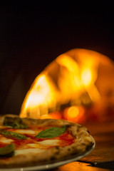 Wood burning fire oven with pizza