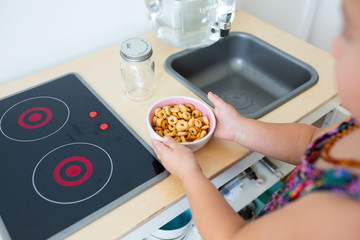 Toddler Girl with Play Kitchen