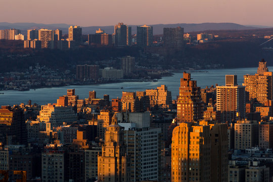 View across Hudson River from Upper West Side of Manhattan to New Jersey at sunset