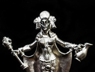 Close-up of silver unpainted gaming miniature