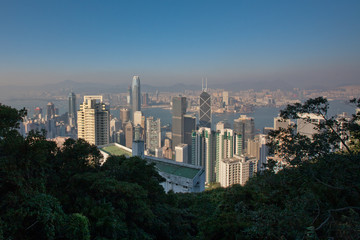 Aerial view of Hong Kong against blue sky