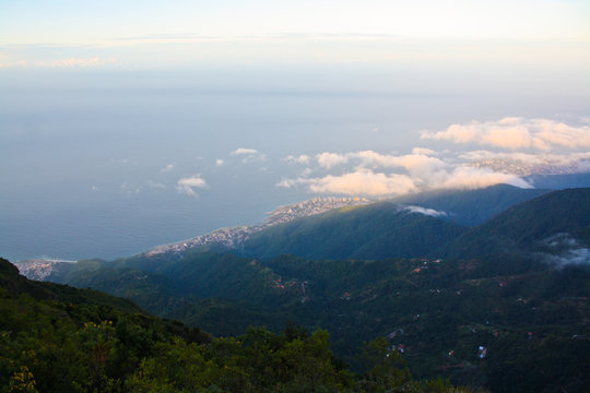 View of the Mountain Chain of El Avila in Venezuela, blue sky and caribbean sea in the background