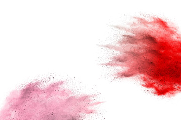 Freeze motion of colorful color powder exploding on white background.  Paint Holi.