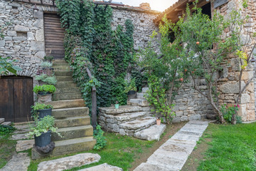 traditional house with stairs in a garden