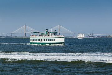 Boat Traffic in Charleston SC Harbor with Cooper River Bridge in BG and Boat Wake in Foreground.