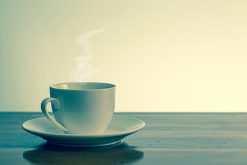 Retro hot coffee on wooden table