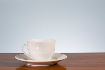 Obraz na płótnie Canvas Empty coffee mug on wooden table