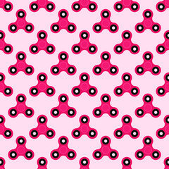 Fidget spinner. Hand toy for stress relief. Seamless pattern with pink spinners for wrapping paper, wallpaper, web page background and more. Vector illustration. EPS10.