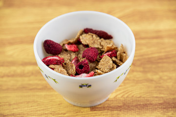 Bowl of cereals with berries