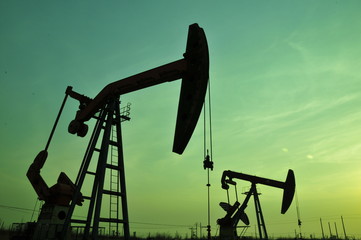 Drilling rig at sunset