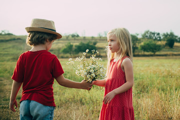 The concept of child friendship and kindness. Sweet angel children. Child care. Romantic and love....