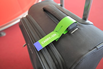 Carry on luggage tag on Suitcase