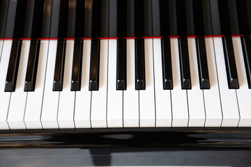 top view piano keyboard , sound board musical instrument black and white color .