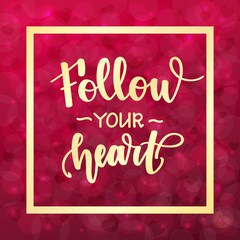 Follow your heart. Handwritten lettering on blurred bokeh background with hearts. Vector illustration for posters, cards and much more.
