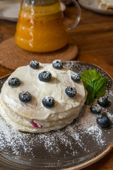 Close up of sweet dessert with fresh blueberries and mint