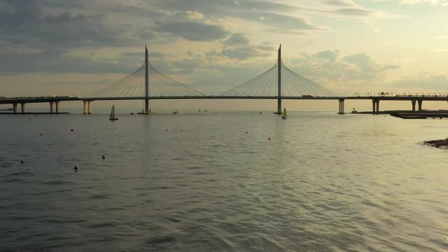 Aerial view of cable-stayed bridge in St.Petersburg during sunset, 4k