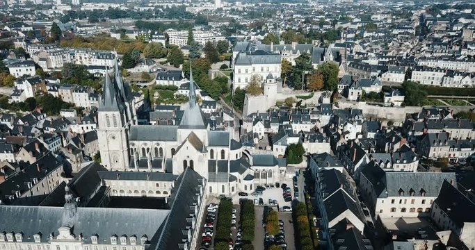 View from drone of French city of Blois with Royal Chateau and church of St. Nicolas in sunny autumn day