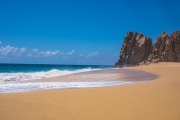 Fototapeta na wymiar Rock formations at Lover's Beach (Playa del Amor) by Cabo San Lucas on the Baja California coast in Mexico.