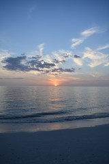 Pink and blue sunset over sea