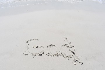 God written in the sand