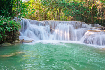 Fototapeta na wymiar waterfall in rainforest at National Park, Thailand