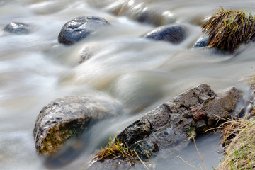 water flowing over rocks