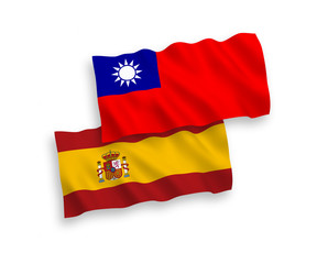 National vector fabric wave flags of Taiwan and Spain isolated on white background. 1 to 2 proportion.