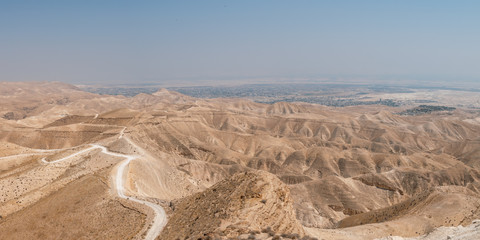 View of the Jordan Valley Desert Mountains and the City of Jericho next to the Dead Sea