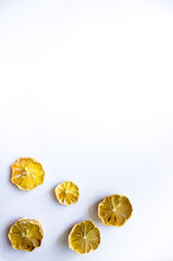 white background with lemon slices. Background with lemon with blank space for text. copy space, top view, flat lay.