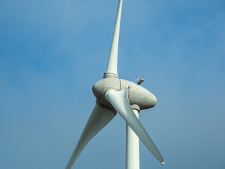 Detail of wind turbine. Close-up to the generator and base of the wind turbines. Renewable energy....